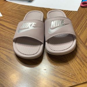 Pink Nike slides